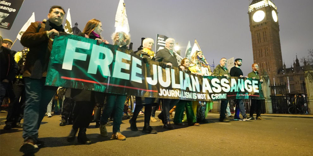 Campaigners pressing for the release of WikiLeaks founder Julian Assange take part in a demonstration.