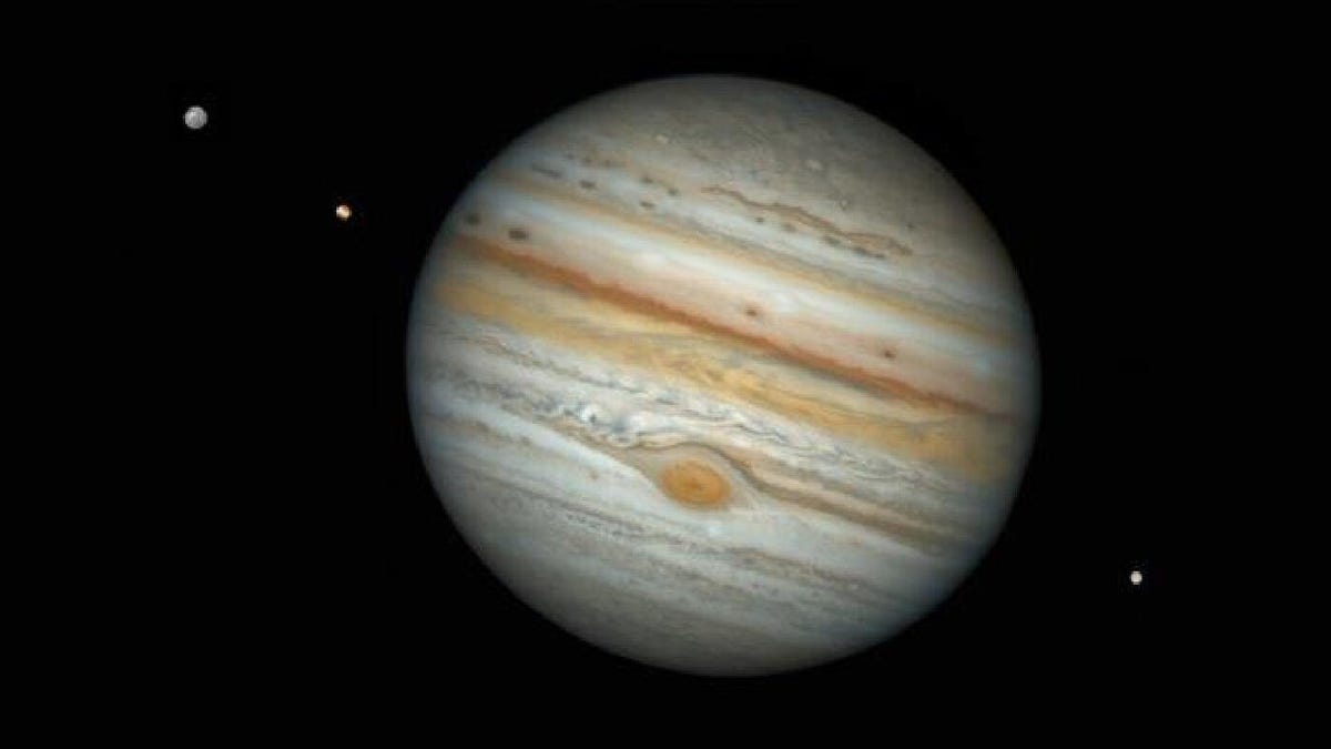 Jupiter and its three largest moons