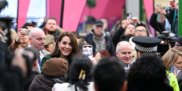 Kate Middleton surrounded by the public during a visit to Kirkgate Market on January 31, 2023 in Leeds, England.