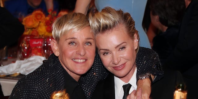 Ellen DeGeneres and Portia de Rossi at the 77th Annual Golden Globes, where DeGeneres was the recipient of The Carol Burnett Award.