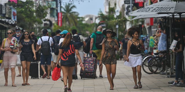 A busy 5th Avenue in Playa del Carmen, Quintana Roo, Mexico, Friday, April 29, 2022.