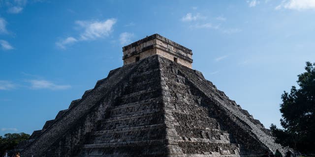 Tourists visit Temple of Kukulcan in Chichen Itza archeological site, in Yucatan, Mexico on Dec. 8, 2022. 