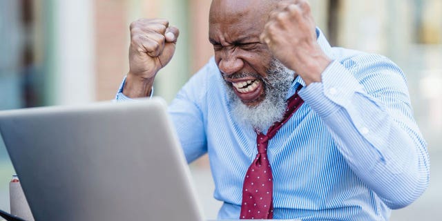 Man visibly upset at his computer because his VPN is causing issues with his search capabilities.