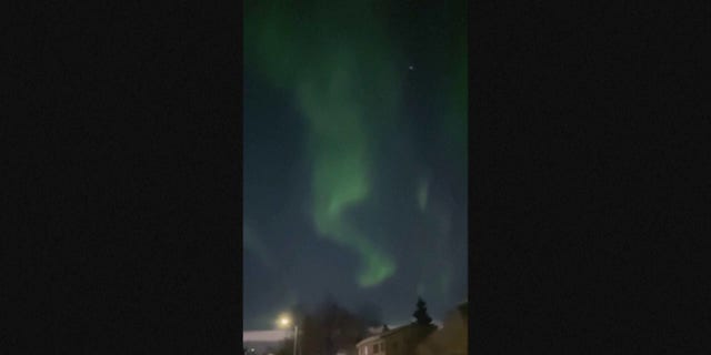 The northern lights dazzled the skies over Anchorage, Alaska, Sunday.