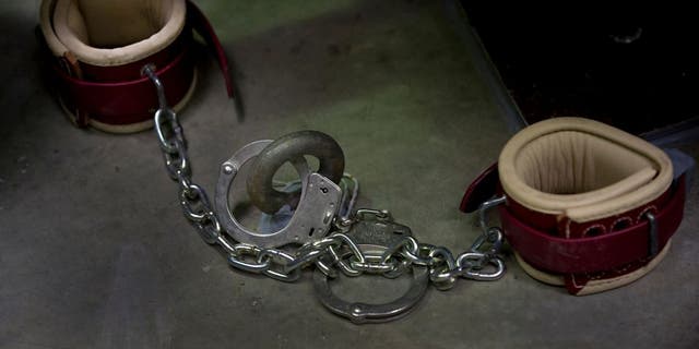 In this photo reviewed by US military officials, a set of typical detainee restraints are seen at Camp VI at the US Detention Center in Guantánamo Bay, Cuba, March 30, 2010.   