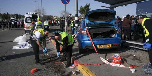 The site of a car-ramming attack at a bus stop in Ramot, Jerusalem, is pictured above on Feb. 10, 2023. A driver drove his car into the stop killing two, and injuring five others.