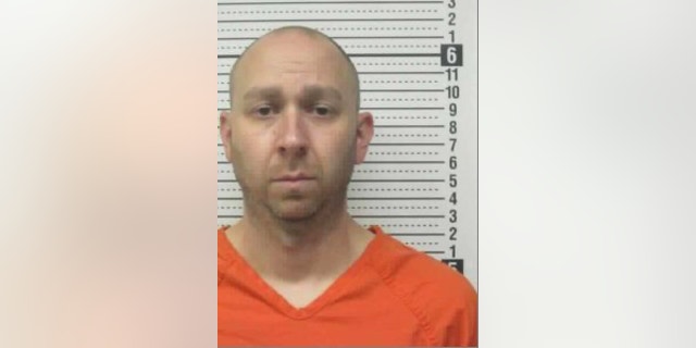 Mugshot of Pastor Phil Hutchings after he was arrested in 2021 for continuing to hold church services in defiance of a provincial health order.