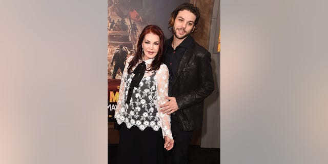 Priscilla Presley, left, poses with son Navarone Garcia at the premiere of "Mad Max: Fury Road."