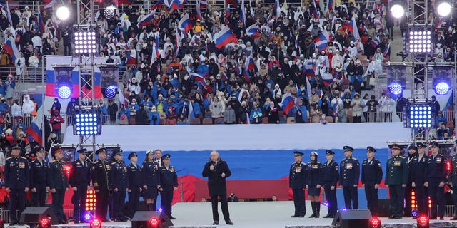 Thousands of people gather at a Moscow stadium for a pro-Putin rally marking Defender of the Fatherland Day as well as the first anniversary of Russia's military invasion of Ukraine.