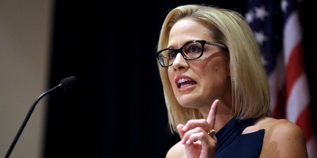 Then-Democratic candidate Kyrsten Sinema speaks to supporters after officially winning the U.S. Senate race at the Omni Montelucia resort in Scottsdale, Arizona, Nov. 12, 2018. 