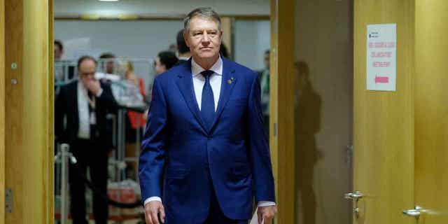 Romanian President Klaus Werner Iohannis arrives for a European Union leaders' summit on February 9, 2023, in Brussels, Belgium. Iohannis was visited by Moldova's president on Thursday.