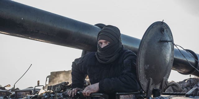 Ukrainian soldiers work with "pion" artillery in the northern direction of the Donbass front line in Donetsk, Ukraine, on Jan. 7, 2023.