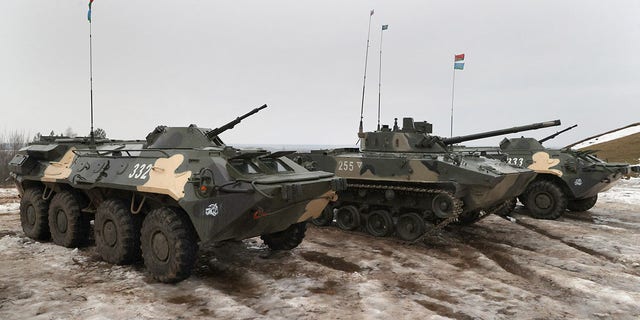 A photograph taken on February 17, 2022, shows Belarus' armored personnel carrier (APC) during joint exercises of the armed forces of Russia and Belarus as part of an inspection of the Union State's Response Force, at a firing range near a town of Osipovichi outside Minsk. 