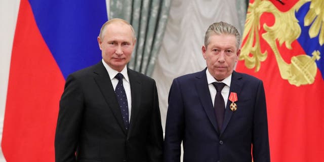 President Vladimir Putin and Ravil Maganov at the Kremlin on Nov. 21, 2019. Maganov, critical of Putin's invasion of Ukraine, died under mysterious circumstances in September 2022.