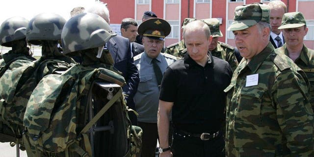 Russian President Vladimir Putin visits a secret service training centre near Makhachkala July 15, 2005.