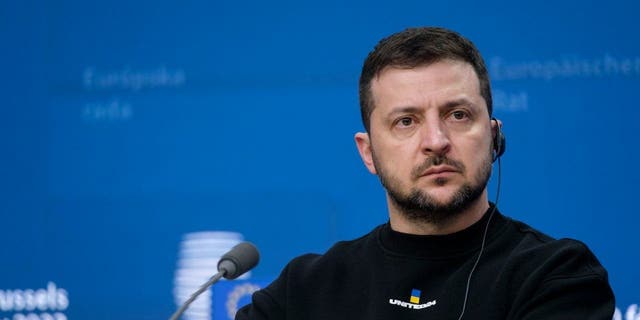 President Volodymyr Zelenskyy talks to media during a press conference following the European Union leaders' summit on Feb. 9, 2023, in Brussels, Belgium. 