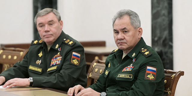Russian Defense Minister Sergei Shoigu and Chief of the General Staff of Russian Armed Forces Valery Gerasimov attend a meeting with Russian President Vladimir Putin in Moscow, Russia. 
