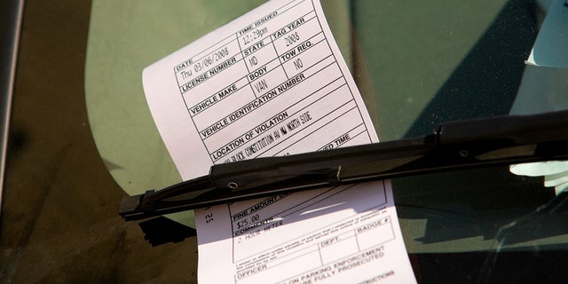 A parking ticket on a car windshield in Washington, D.C. A plan recently introduced in the District of Columbia Council calls for officials to train 80 residents on how they can use their smartphones to take pictures of vehicles illegally parked in locations such as crosswalks, bicycle lanes and in front of hydrants. 