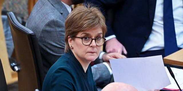 First Minister Nicola Sturgeon awaits the start of First Minister's Questions in the Scottish Parliament, on Jan. 26, 2023, in Edinburgh, Scotland. 
