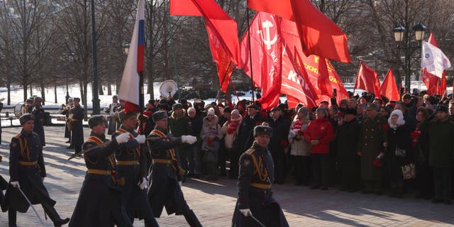 Russian Presidential Regiment soldiers march during a wreath-laying ceremony on February 23, 2023, in Moscow. 