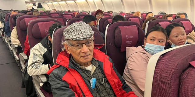 French serial killer Charles Sobhraj sits in an aircraft from Kathmandu to France, on December 23, 2022.