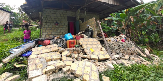 A damaged house is shown following an earthquake in Jayapura, Papua province, on Feb. 9, 2023. The earthquake shook Papua on Thursday, killing four people.