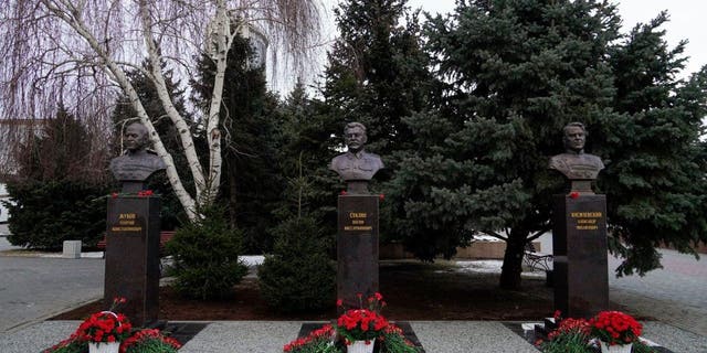 A picture shows the newly unveiled bronze busts of Soviet Marshals Georgy Zhukov, left, and Alexander Vasilevsky, right, and Soviet leader Joseph Stalin outside the museum dedicated to the Battle of Stalingrad in the southern Russian city of Volgograd on Feb. 1, 2023, on the eve of commemorations of the Soviet victory in the Stalingrad battle. 