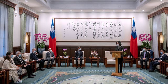 Taiwan's President Tsai Ing-wen, center right, speaks during a meeting with Swiss lawmakers in Taipei, Taiwan, on Feb. 6, 2023. 