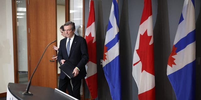 Toronto Mayor John Tory arrives at a press conference where he steps down as Mayor after revealing that he had an affair with an employee who was part of his staff at City Hall in Toronto, Feb. 10, 2023. 