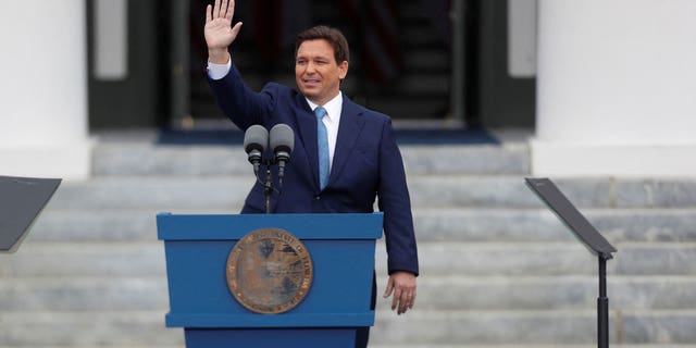 Florida's Governor Ron DeSantis after taking the oath of office waves to those in attendance at his second term inauguration in Tallahassee, Florida, U.S. January 3, 2023.