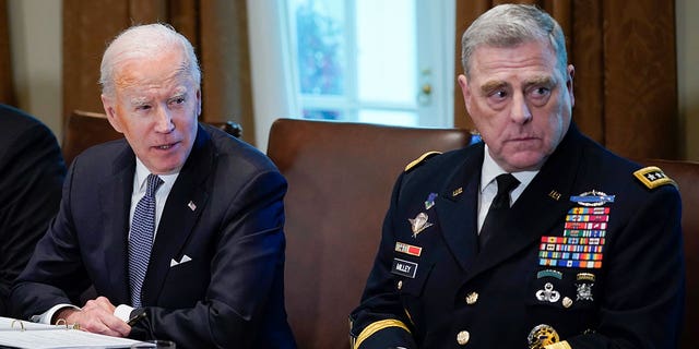 President Joe Biden and Chairman of the Joint Chiefs of Staff Gen. Mark Milley attend a meeting with military leaders in the Cabinet Room at the White House on April 20, 2022.