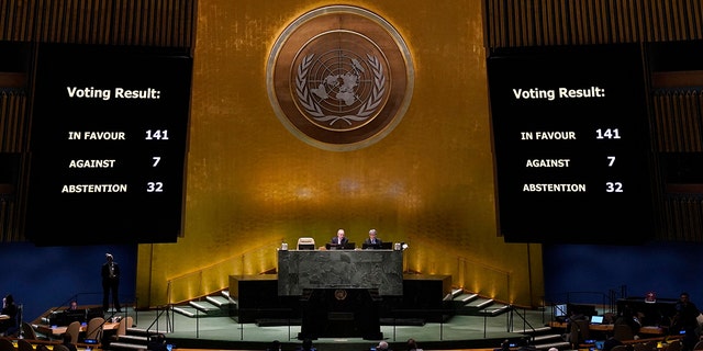 Screens display the vote count during the Eleventh Emergency Special Session of the General Assembly on Ukraine, at UN headquarters in New York City on February 23, 2023. 