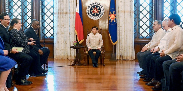 Philippine President Ferdinand Marcos Jr., center, talks with U.S. Secretary of Defense Lloyd James Austin III, third from left, during a courtesy call at the Malacanang Palace in Manila, Philippines on Thursday, Feb. 2, 2023. 