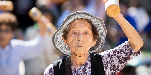 People exercise during a 'Respect for the Aged Day' in Tokyo, Japan, on Sept. 18, 2017. 