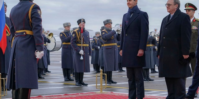 Syrian President Bashar Assad reviews an honor guard during a welcome ceremony in Moscow, Russia, Tuesday, March 14, 2023.