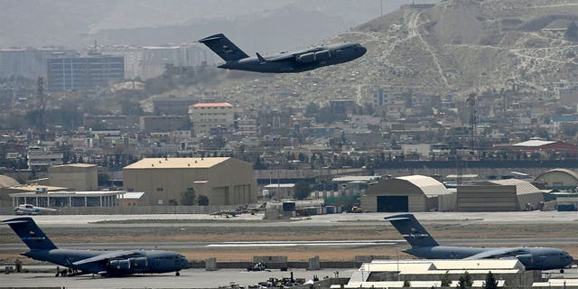 A US Air Force aircraft takes off from the airport in Kabul on Aug. 30, 2021.