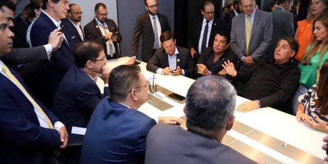 Brazil's former president, Jair Bolsonaro, attends a meeting with members of his party and allies after returning from self-imposed exile in Florida to Brasilia, Brazil, on March 30, 2023.