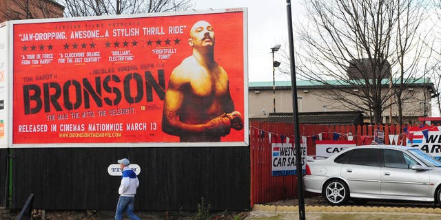 The entrance of Wakefield Prison where Charles Bronson, is being held lies behind a billboard advertising the new film "Bronson," about the life of the man described as Britain's most dangerous criminal, starring Tom Hardy in the lead role.