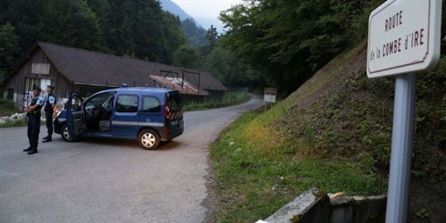A van with French police next to it in the French Alps.