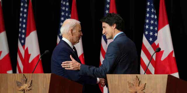 U.S. President Joe Biden and Canada's Prime Minister Justin Trudeau are pictured in Ottawa, Ontario, on March 24, 2023. 