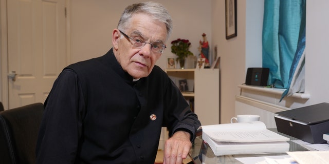 Rev. Patrick Pullicino, 73, is pursuing legal action against an NHS trust after he was allegedly expelled for answering a patient's questions.