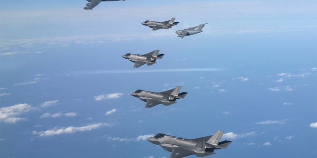 A U.S. B-52, C-17 and South Korean F-35 fighter jets fly over the Korean Peninsula during a joint air drill in South Korea on Dec. 20, 2022.