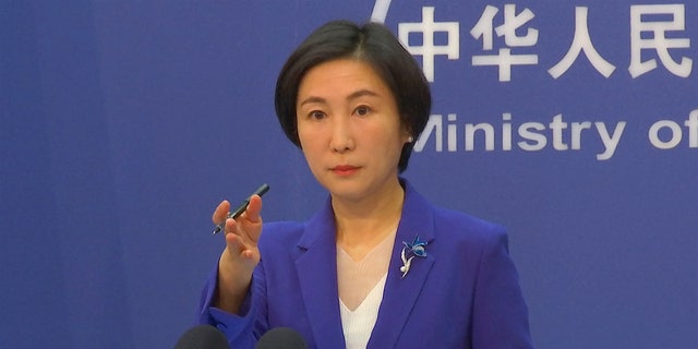 Chinese Foreign Ministry spokesperson Mao Ning gestures during a press conference at the Ministry of Foreign Affairs in Beijing, Oct 13, 2022.