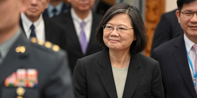 Taiwan President Tsai Ing-wen arrives at the boarding gate of the international airport in Taoyuan on March 29, 2023. 