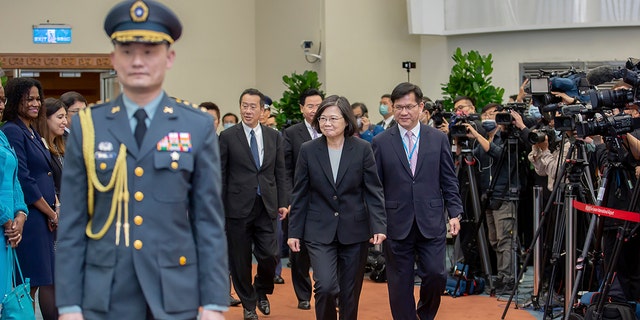 Taiwan's President Tsai Ing-wen prepares to depart on an overseas trip at Taoyuan International Airport in Taipei, Taiwan, Wednesday, March 29, 2023. 