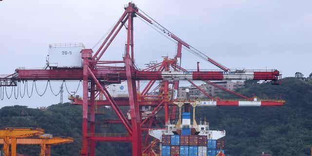 A cargo ship is shown docked at a port in Keelung, Taiwan, on Jan. 7, 2022.