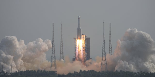 A Long March-5B Y4 rocket, carrying the Mengtian lab module for China's under-construction space station Tiangong, takes off from Wenchang Spacecraft Launch Site in Hainan province, China October 31, 2022. 