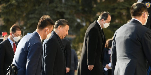 Chinese President Xi Jinping, center, arrives at the Kremlin to attend a meeting with Russian President Vladimir Putin in Moscow March 20, 2023.