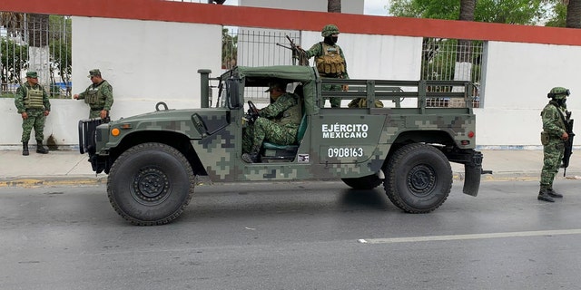 Mexican army soldiers prepare a search mission for four U.S. citizens kidnapped by gunmen in Matamoros, Mexico, Monday, March 6, 2023.