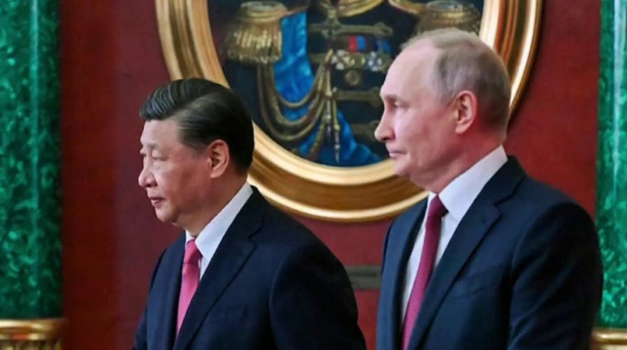 Putin and Xi sign agreement to expand economic ties
